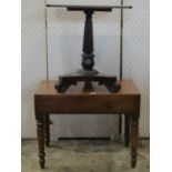 A 19th century mahogany bidet with loose box lid raised on ring turned and tapered supports, (