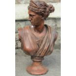 A composition stone bust of Diana with simulated terracotta finish, 52 cm high