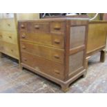 Oak chest of three long and three short drawers by 'Rowley 140-142 Church Street', with carved and