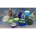 A collection of eight modern glass paperweights, including two pears, two millefiori examples, a