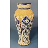 A Doulton oviform vase with incised floral detail and repeating border