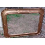 A contemporary gilt framed wall mirror, the moulded frame with cross hatch and other detail and with