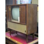 A Myrth vintage black and white television model number V879c in original cabinet with tambour front