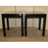 A pair of Chinese ebonised occasional tables of square cut form with square cut supports, 44 cm