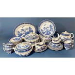 An extensive collection of Booth's Real Old Willow comprising dinner plates, tureens, bowls, side