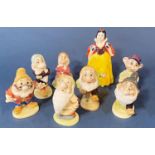 A group of 6 Beswick and 1 Royal Doulton figures of Snow White and a mixture of dwarf's