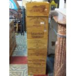 7 pine wine packing crates with varying printed labels