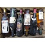 A mixed case of twelve vintage wines, including two 1974 Barca’s a Spanish Bairrada, and others.