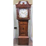 A substantial mid-19th century oak and walnut cross banded longcase clock with turned column