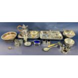 A section of silver plated table ware, including a tureen, several napkin rings, salt and pepper