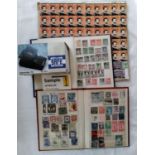 A box containing a large collection of loose stamps, a stamp album, two stock books, a boxed