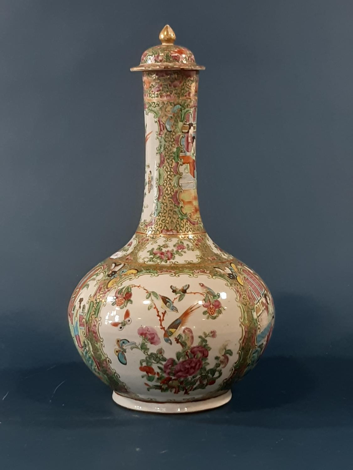 Chinese 19th Century Canton famille rose bottle vase with cover, depicting figures in a garden, - Image 2 of 3