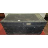 19th century camphor wood travelling trunk, overlaid in leather with brass banded supports and