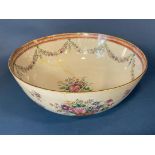 A large Chinese export porcelain punch bowl, with bouquets of flowers and flower garland decoration,