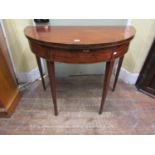 Georgian mahogany demi-lune fold over top tea table with cross banded borders, raised on square
