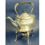 A Georgian silver plated tea kettle on stand with burner below, 34cm high.