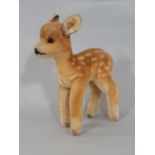 Small soft toy fawn, unmarked, in the style of Steiff circa 1950 with glass eyes, stitched nose, not