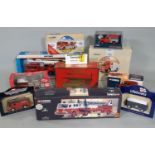 Large collection of boxed and unboxed model fire engines and fire service vehicles including boxed