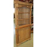19th century stripped and waxed pine freestanding barrel back corner cupboard, with applied