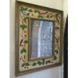 A decorative wall mirror, the frame with hand painted detail showing birds and finches within a