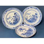 Three 18th Century Chinese blue and white porcelain dishes, largest diameter 23.5 cm (3)