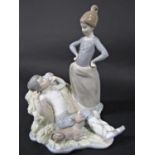 A Lladro figure group of a girl waking a boy harvester with printed mark to base, 25cm tall approx