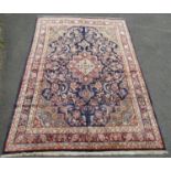 A good quality Hamadan carpet with a thick wool pile with an overall floral pattern on a dark blue