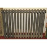 A good quality cast iron floorstanding radiator (appears unused) approximately 709 cm high x 95 cm