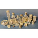 Nineteen glass scent/dressing table glass bottles, etc, all with silver necks or lids