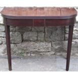 Georgian mahogany D-end fold over top tea table with reeded borders raised on square tapered