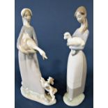 Five Lladro figures of young girls comprising one holding a lamb, another holding a goose with a dog