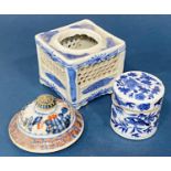 Three Chinese blue and white porcelain items to include: pierced pot, circular box with cover and