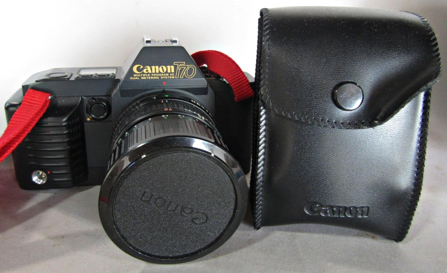 Canon T70 camera with zoom lens FD 35-70 mm and F.D 50 mm - 1:18 with carry case and accessories - Image 3 of 3