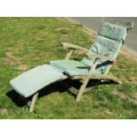 A good quality weathered contemporary hardwood folding steamer type garden chair with slatted