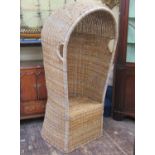 Wicker garden chair with hooded canopy and horseshoe shaped seat, 170cm H