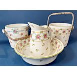 A collection of Minton china with repeating rosebud detail including two slop buckets, ewer and
