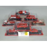 Collection of 1:64 scale mounted model fire service vehicles each displayed on a plinth with name of