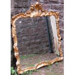 A Georgian gilded wall mirror with floral detail, the frame 92cm x 80cm