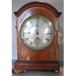 A late 19th century mahogany bracket clock, the case with brass and other inlaid detail, with
