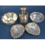 A selection of 19th/20th century silver ware comprising a scent bottle with silver sleeve, a pair of