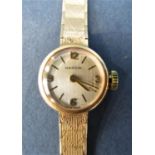 A Marvin ladies cocktail watch with 9ct gold case and bracelet (currently running) total weight