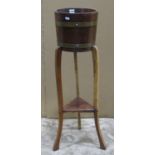 An R A Lister & Co Ltd coopered oak and banded jardiniere and fixed stand
