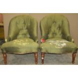 A pair of Victorian style low spoon and button back upholstered drawing room/bedroom chairs raised