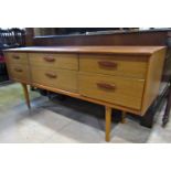 A retro teak veneered long and low dressing table/sideboard fitted with a side by side arrangement
