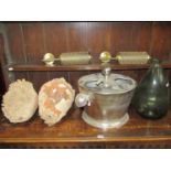 Two terracotta vessels with marine encrustations, glass bottle, plated wine cooler, etc
