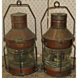 A pair of copper marine lanterns by Seahorse, anchor and not under command, numbers 26351 and 26559