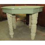 A pair of breakfront side tables with moulded outline and raised on acanthus leaf carved supports