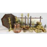 A collection of brass ware, including a pair of spiral twist candlesticks, a pair of 19th century