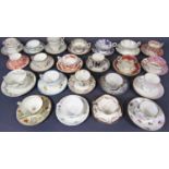 A collection of twenty two 19th century cabinet cups and saucers, various makers, with floral and