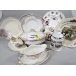 A collection of twelve Royal Albert - Flowers of the Month series tea cups and saucers, with various